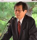 基調講演する守安さん