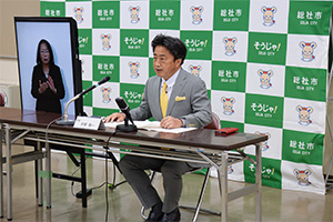 緊急会見