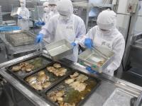 豚肉の生姜焼きを配缶の画像